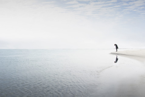 Silhouette of woman staring at edge of water
Hampstead, North Carolina, USA