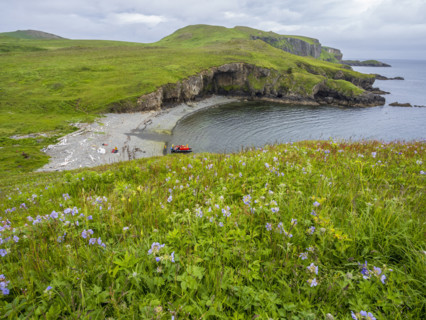 Tourists on raft at green coast
Unga Village, Alaska, USA