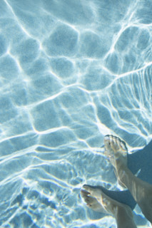 Overhead view of mans feet in swimming pool
St. John, US Virgin Islands, USA