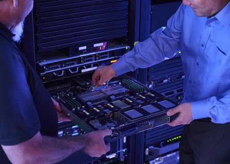 Two men working in data center