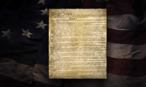 American Constitution superimposed over early thirteen star flag