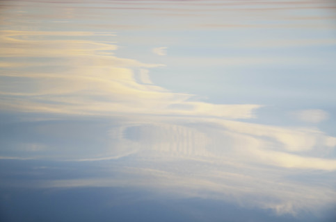 Evening sky reflected on lake surface