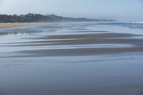USA, Oregon, Newport, Empty wet Oregon beach