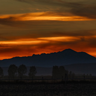 USA, Idaho, Bellevue, Silhouette of hill against sky at sunset