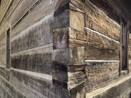 Close-up of dovetail joint on log cabin