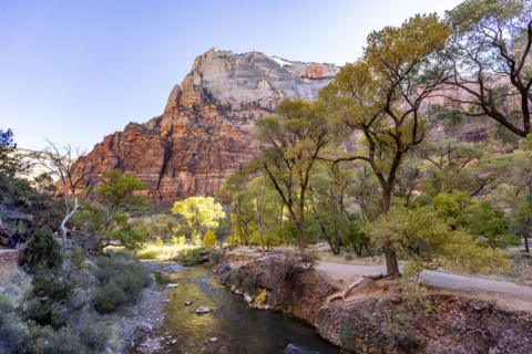 USA, Utah, Zion National Park, Virgin River and rock formations on sunny day