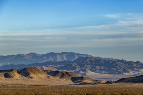USA, California, Baker, Desert landscape with rocky mountain