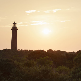 USA, North Carolina, Corolla, Currituck Lighthouse silhouette at sunset