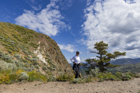 Portrait of smiling woman on Carbonate Mountain trail. Hailey, Idaho, USA.