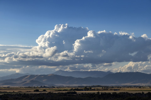 White puffy clouds over mountains. Bellevue, Idaho, USA.