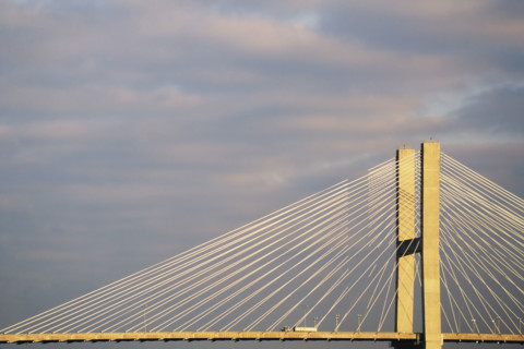 Truck on Talmadge Memorial Bridge against sky. Savannah, Georgia, USA.