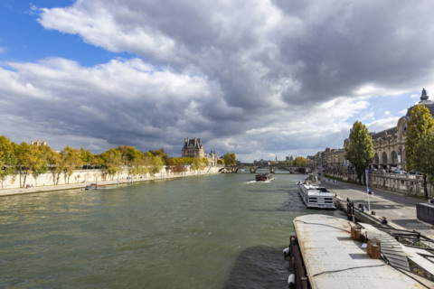 Thick clouds above Seine River. Paris, Ile de France, France.