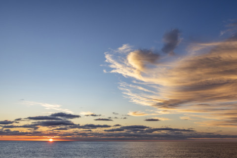 Clouds above ocean at sunset. La Jolla, California, USA.
