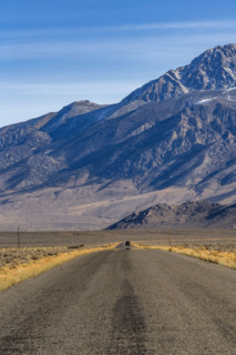 Empty rural road over Trail Creek Pass. Mackay, Idaho, USA.