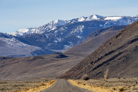Empty rural road over Trail Creek Pass. Mackay, Idaho, USA.