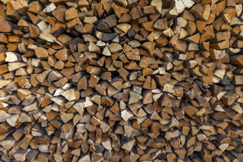 Close-up of firewood stacked for winter. Bellevue, Idaho, USA.