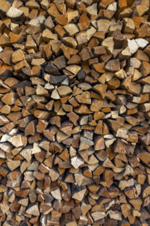 Close-up of firewood stacked for winter. Bellevue, Idaho, USA.