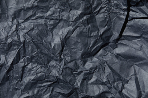 Close-up of wrinkled black tissue paper. New York City, New York State, USA.