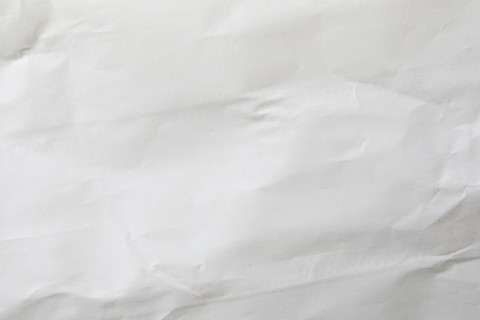 Close-up of blank white wrinkled paper. New York City, New York State, USA.