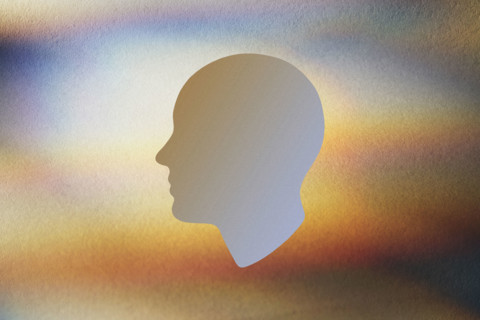 Face shape on abstract background. New York City, New York State, USA.