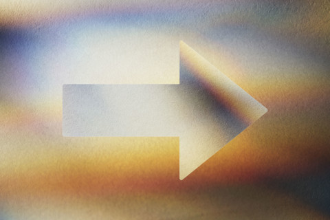 Arrow shape on abstract background. New York City, New York State, USA.