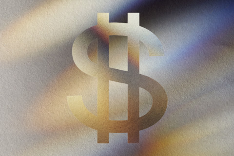 US Dollar symbol on abstract background. New York City, New York State, USA.