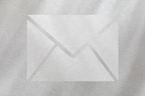 Mail icon on white textured background. New York City, New York State, USA.