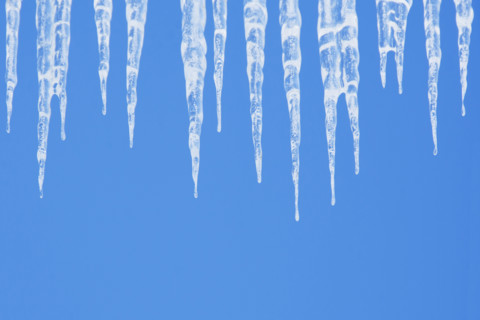 Icicles against clear blue sky. Nashville, Tennessee, USA.