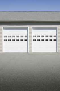 Closed garage doors on sunny day. Mendham, New Jersey, USA.