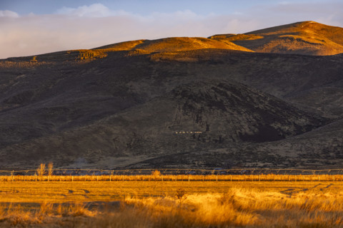 Fields and hills at sunset, Bellevue, Idaho, USA.