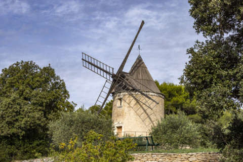 Antique windmill in rural landscape, Gordes, Vaucluse, France.
