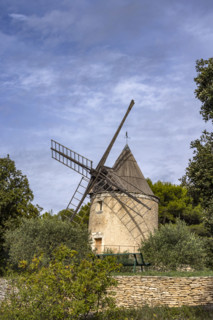Antique windmill in rural landscape, Gordes, Vaucluse, France.