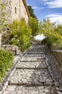 Empty stone path in old village, Gordes, Vaucluse, France.