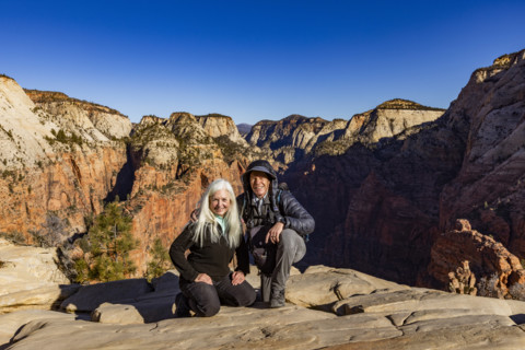 Portrait of senior couple atop Angels Landing, Zion National Park, Utah, USA.