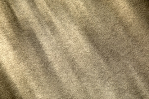 Beige textured grunge background, New York City, New York, USA.