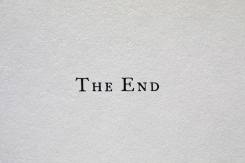 The End typed on white paper, New York City, New York, USA.