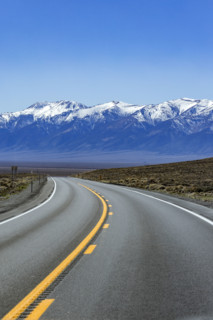 To lane highway leading to mountains