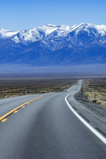 To lane highway leading to mountains