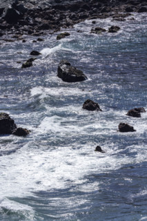 Ocean waves washing rocky coast