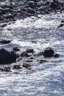 Ocean waves washing rocky coast