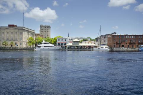 Yacht and waterfront buildings