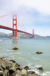 Morning fog lifting over Golden Gate Bridge