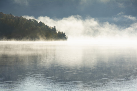 Morning mist on calm Lake Placid