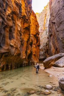 Portrait of senior woman wading The Narrows of Virgin River