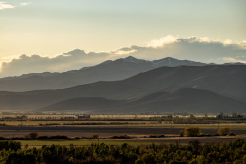 Clouds above mountains at sunset