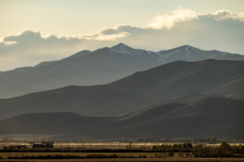 Clouds above mountains at sunset