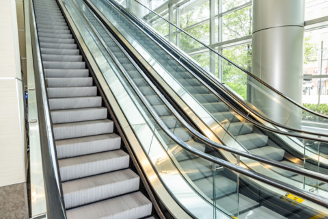 Empty escalators in modern building
