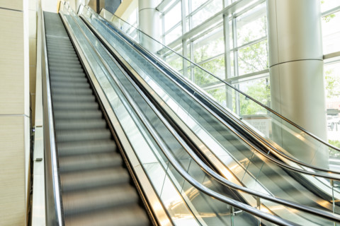 Empty escalators in modern building