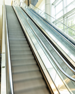 Empty escalators in modern building