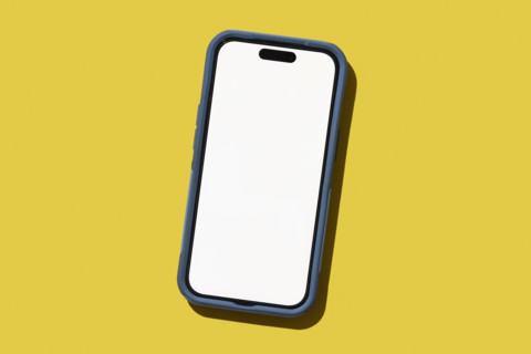 Blank smart phone on yellow background